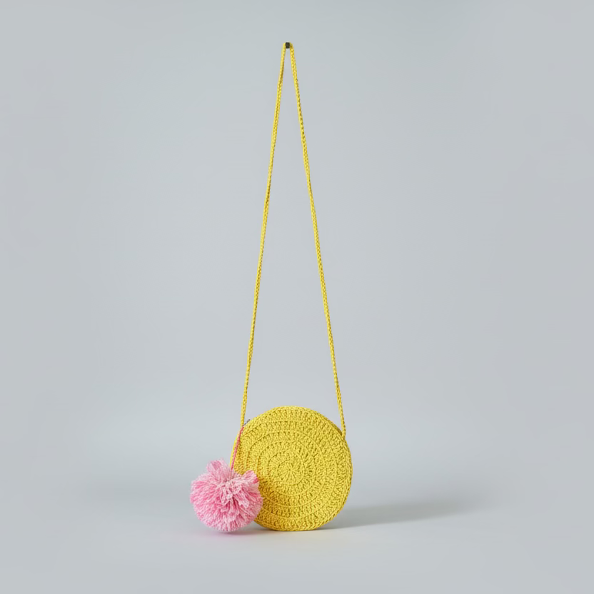 HANDCRAFTED YELLOW ROUND CROCHET SLING BAG WITH BLUSH POMPOM
